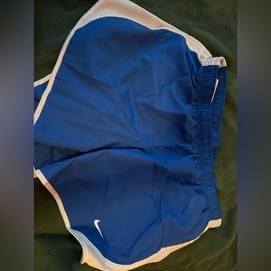 XL in kids, blue nike athletic shorts.